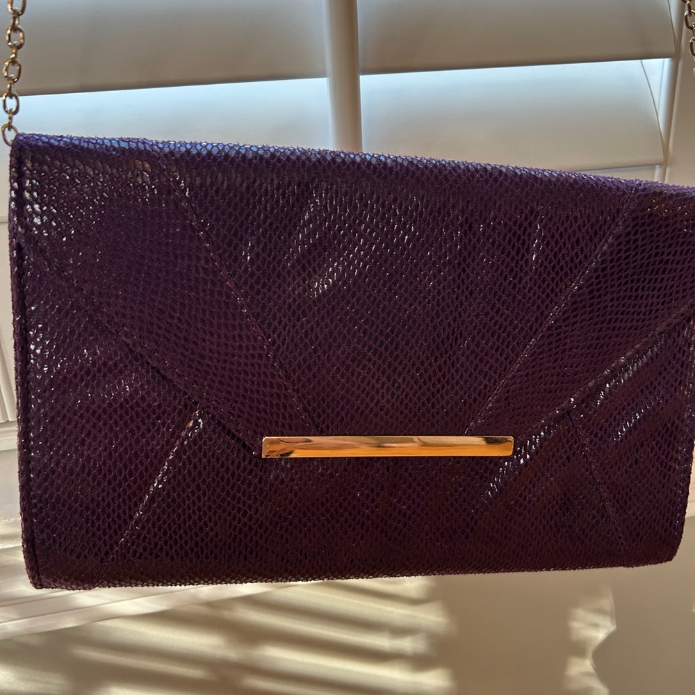 Purple snakeskin clutch with chain